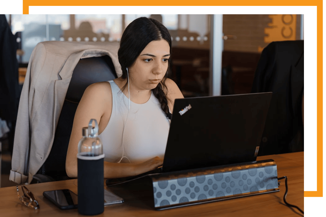 Alter Solutions consultant working at the computer